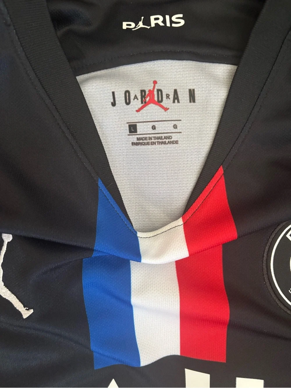 Jordan Men’s Black PSG Football Jersey with Red, White & Blue Stripes